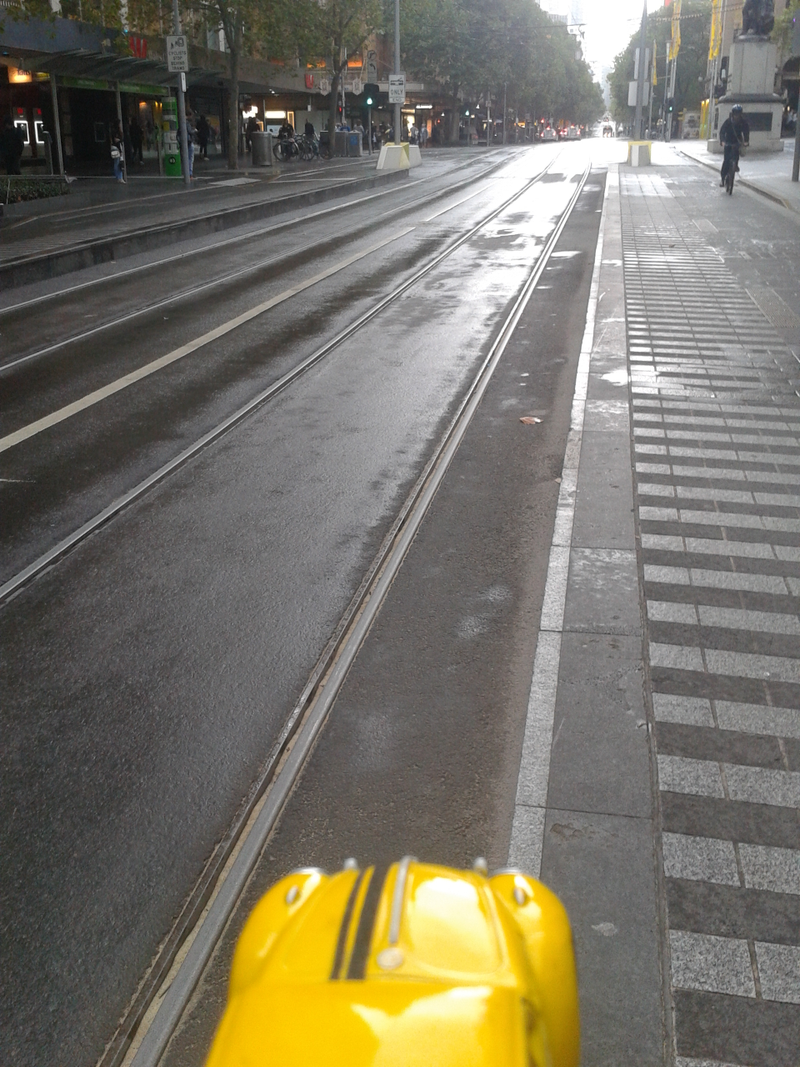 Swanson Street , waiting for a tram , looks a liittle different since AC/DC were here